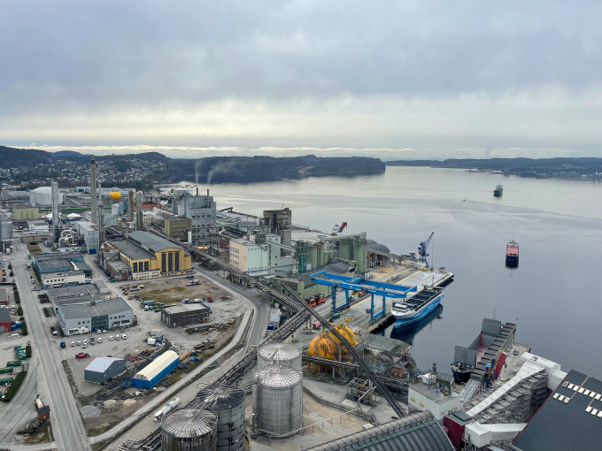 Yara Birkeland at dock alongside Yara’s fertiliser plant in Porsgrunn. View from the prilling tower, which was completed in 1987 and was Norway’s tallest building at the time. Photo: The Royal Court